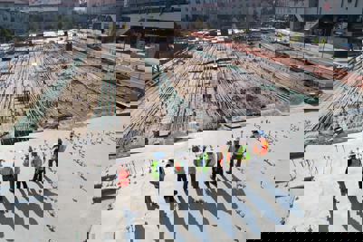 workers overviewing progress